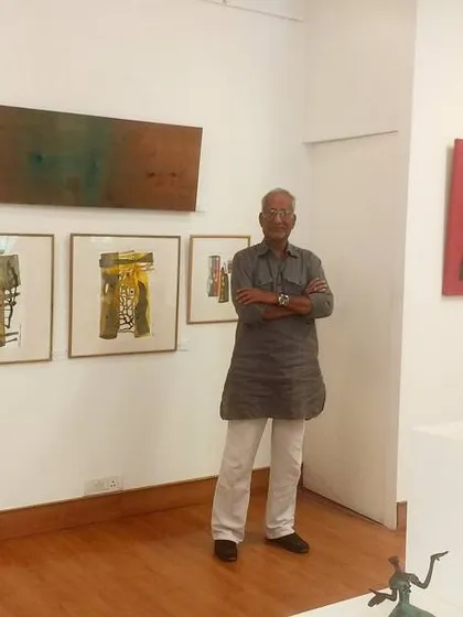 Artist Hariraam V stands with his work during his exhibition at my gallery. I believe in building personal relationships with artists, creating a space where they feel supported and their creative vision is respected and understood.