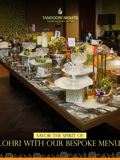 Savor the spirit of Lohri with our bespoke menu and beautiful table setups. This grand buffet display in traditional serveware is perfect for both cozy gatherings and grand events.