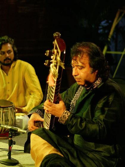 A close-up of me watching Ustad Rafique Khan saheb play the sitar.
