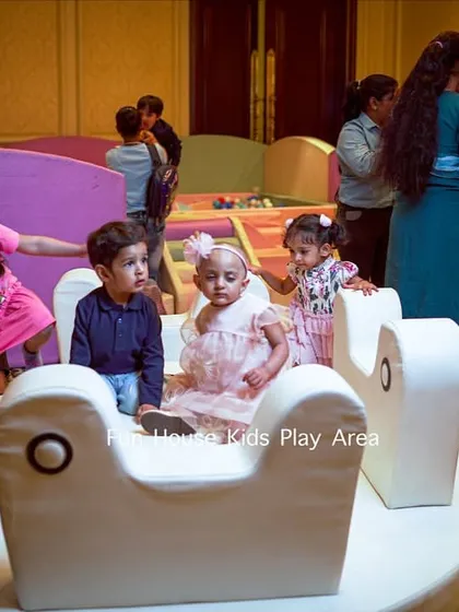 Young party guests enjoying the soft, safe seating of our white merry-go-round. It’s a gentle and interactive ride perfect for toddlers during indoor events.