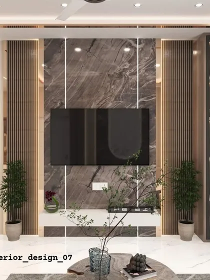 A living room TV wall that balances dark marble, wood fluting, and metallic accents. The integrated planters on the console bring a touch of nature indoors.