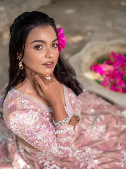A celebrity-inspired makeover for a model shoot, with a radiant glow and soft makeup.