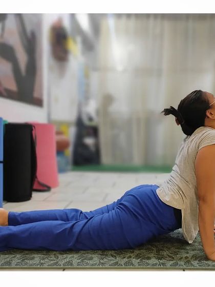 An overview of the benefits of Bhujangasana (Cobra Pose), which strengthens the back, tones the abdomen, and improves blood circulation.