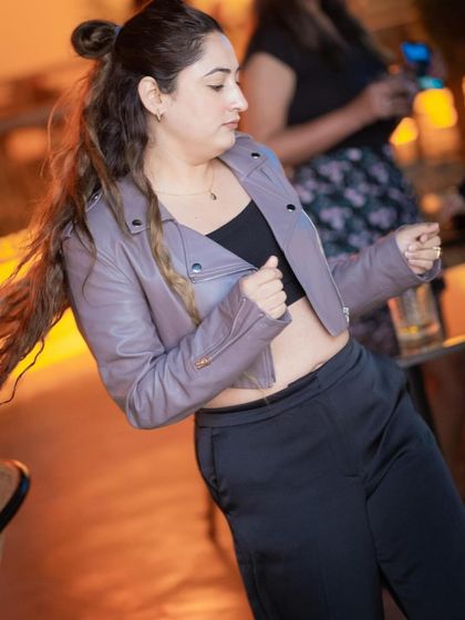 A candid of a guest dancing, hair in motion. I love capturing these moments of freedom.