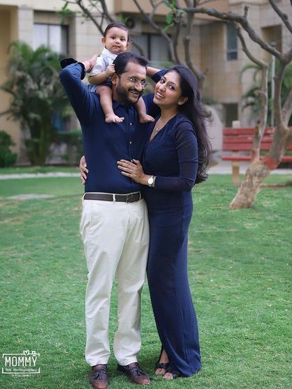 These standing portraits show the beautiful bond between parents and their baby boy during a lovely outdoor family session in a Delhi-Gurgaon park.