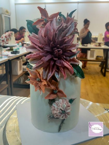 Here is the two-tiered cake with chocolate-sculpted dahlias that I created during the workshop. It was a struggle at first, but I really enjoyed the process once I got the hang of it. I'm excited to practice this technique more before offering it for orders.