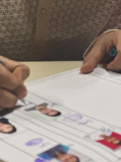A detailed view of a couple signing their marriage register. This document is the foundation of your legal union, and I ensure it is handled with care.