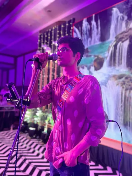 A moment of focus during a live show. The stage lights, the music, the crowd, it all comes together. This was taken during a performance at a large wedding event.