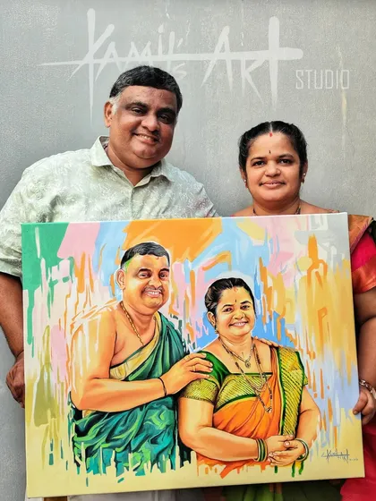 A happy client with their custom anniversary painting. I used acrylics to create this vibrant portrait with a modern, abstract background.