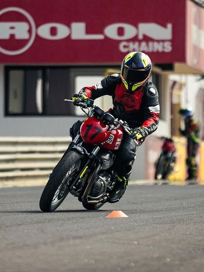 A rider practicing the counter-steering drill. We provide individual feedback to ensure each participant masters this technique for safer, faster riding.