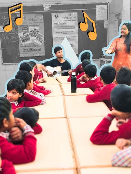 Our fellows work together to lead a session, demonstrating collaboration and teamwork for the students. The children are seated at tables, showing how we adapt to different classroom layouts.