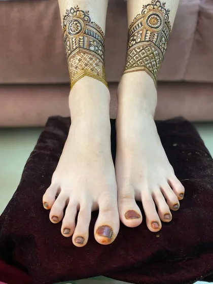 A view of the leg mehendi from a distance, showing how the design looks as a whole.