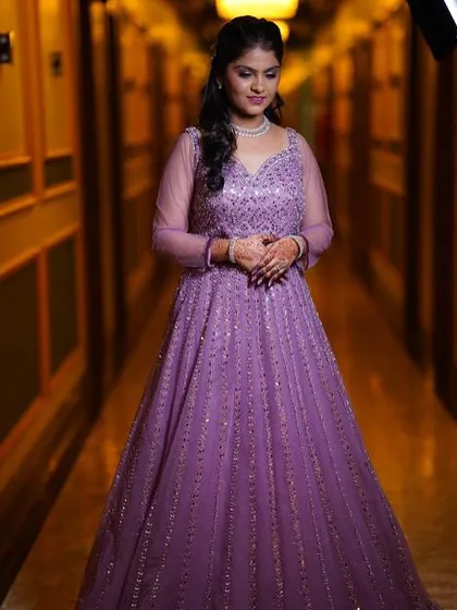 A full-length view of this stunning engagement bride. Her glamorous makeup and elegant gown made for a truly show-stopping look.