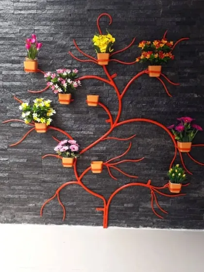 This metal tree wall art is a beautiful and space saving solution for plant lovers. We can customize the size and color to fit your wall perfectly.