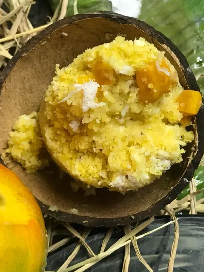 We're celebrating the last few days of mango season. Our menu features seasonal beauties like Mambhazha Pulisseri (Ripe Mango Curry) and this delicious Mango Puttu, a steamed cake of rice and fresh mango.