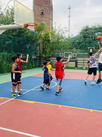 A player takes a jump shot.