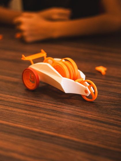 Another angle of our spring-powered car, showcasing the design and the satisfaction of a completed build.