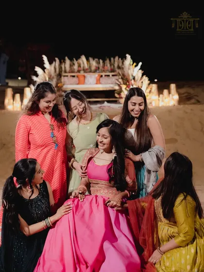 A bride surrounded by her friends at her desert Mehendi. The intimate and relaxed setting we created allowed for these beautiful, candid moments of friendship and support.