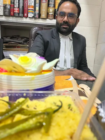A candid shot of my mentor on Teacher's Day, surrounded by the celebration we organized for him.