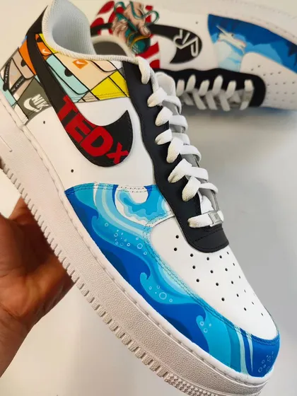 The design continues onto the toe box, with ocean waves representing his love for travel and the sea. Every part of the shoe tells a piece of his story.