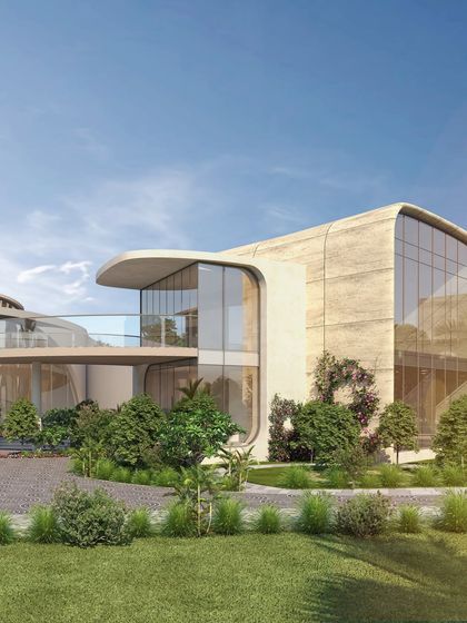 A close-up render of the Cipla Museum, highlighting the smooth, stone-like texture of the façade and the large, curved glass walls. The design is meant to feel both monumental and approachable.