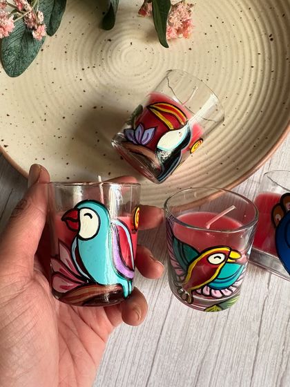 A handful of our tropical bird-themed candles, including parrots and toucans.
