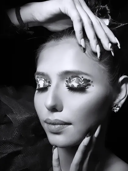 A black and white photography look focusing on creative eye art. I teach students how to design makeup that is impactful even without color.