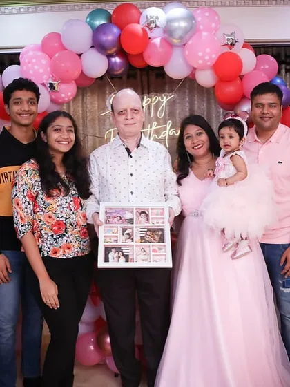 The whole family celebrating a birthday, with the personalized story frame held proudly as a centerpiece of their memories.