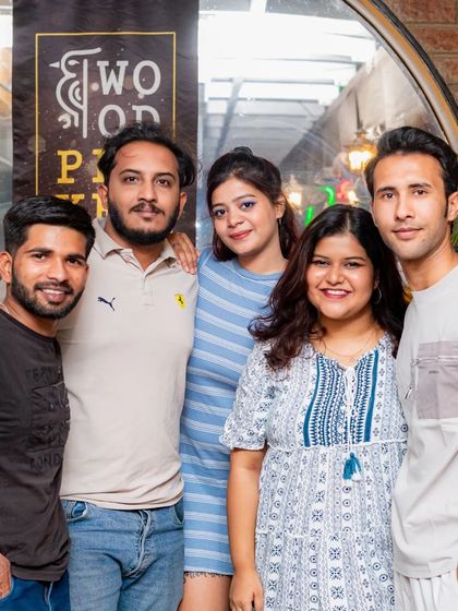 This group of friends is ready for a fun night.