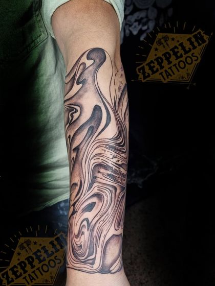Another view of "The Chaos" sleeve, showing how the abstract patterns wrap around the forearm.