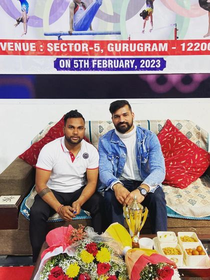 With a fellow coach at the Inter-Academy Gymnastics Championship in Gurugram. Events like these are important for the growth of our students and the sport.