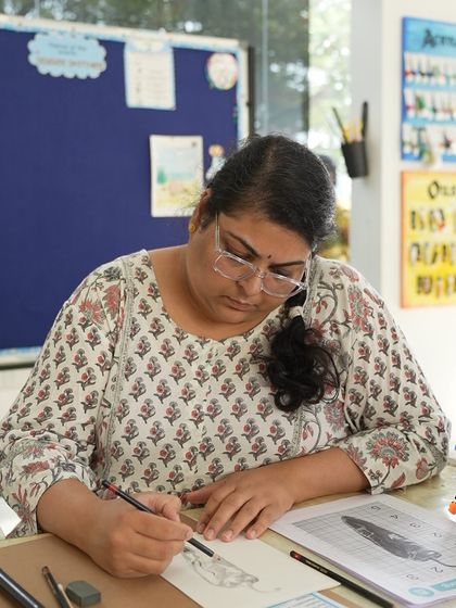 Focused on her drawing, this CFA student is learning the fundamentals of shading and form.