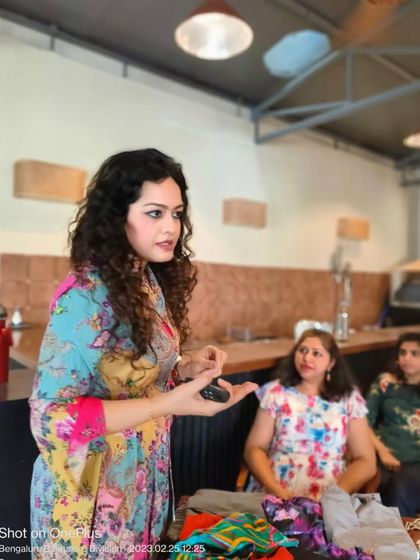 Explaining the principles of accessorizing during the Herkey workshop. The right accessories can completely transform an outfit and communicate your personal style.