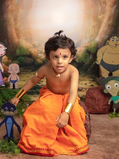 Chhota Bheem is ready to fight! This little hero shows off his strength in our fun cartoon-themed shoot.