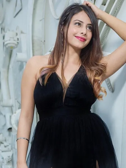This makeup look is all about classic elegance for an evening affair. I created a soft glam style with a subtle smokey eye and a pink lip to complement the plunging neckline of the black dress. It’s a sophisticated choice for a formal dinner or a cocktail event.