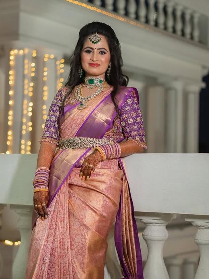 Sushma looking poised and elegant against the evening lights. Her makeup is designed to look flawless in any lighting, from natural twilight to indoor reception lights.