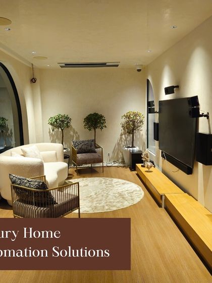 This view of our experience center highlights the clean integration of technology, including wall-mounted speakers and a sleek TV setup, demonstrating our commitment to luxury home automation solutions.