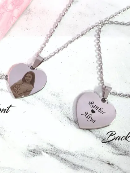 This heart-shaped pendant is double the love. We engrave your favorite photo on the front and your names on the back, creating a two-sided keepsake that’s full of meaning.