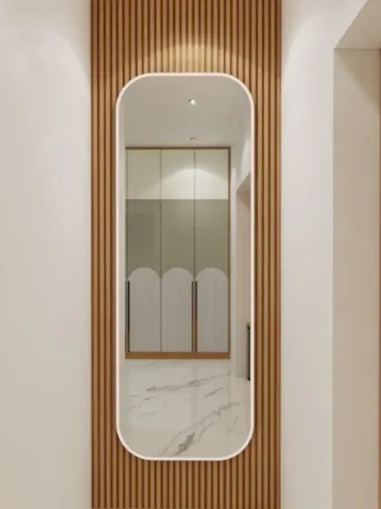 A modern vanity mirror with a wooden-slat background, adding a touch of texture and warmth to a dressing area.