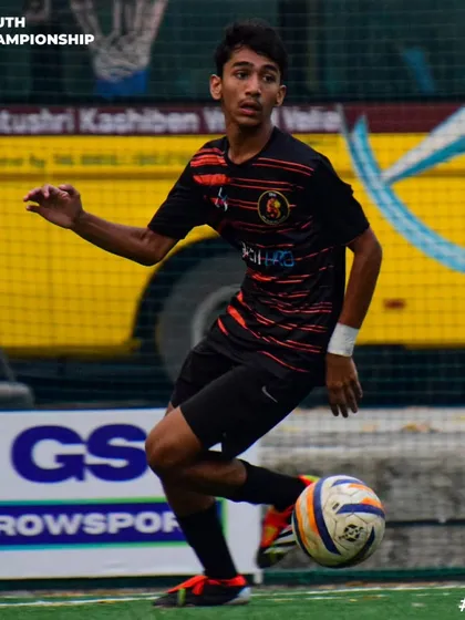 Every pass counts, every moment matters. A player in control, looking for the perfect pass.