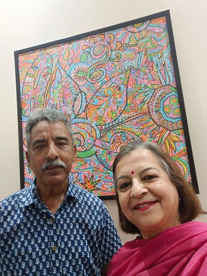 My aunt and uncle with their new canvas print. It makes me so happy to see my art become a part of my family's life and memories.