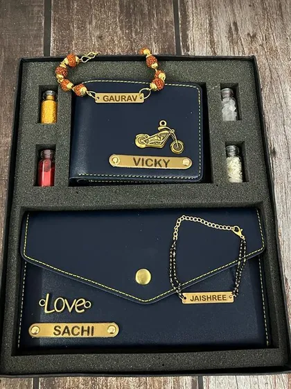 The bhai-bhabhi wallet and rakhi combo shown in a classic blue leather finish.