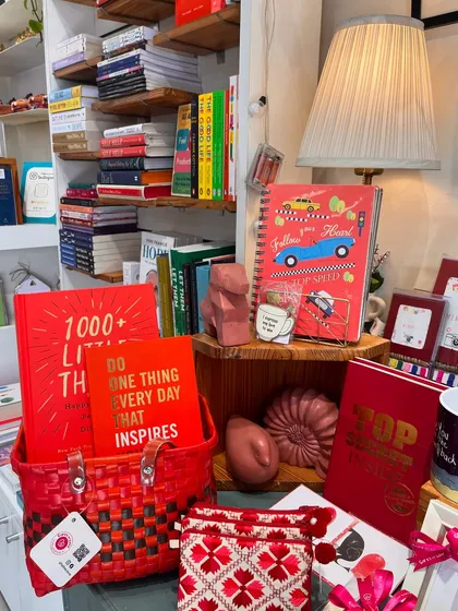 A display of red-themed gifts and books as I was gearing up to open my new store at Nirvana Courtyard.