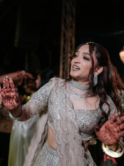 Dancing the night away! This bride's makeup is designed to be sweat-proof and long-lasting, so she can enjoy her sangeet without any worries.