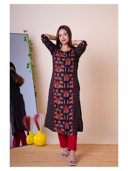 A playful pose from the same shoot, adding a bit of personality to the lookbook.