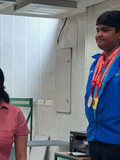 We celebrate individual and team victories alike. Here, young Aayush stands proud after winning a silver medal in the Sub-Youth Men's Air Rifle individual event.