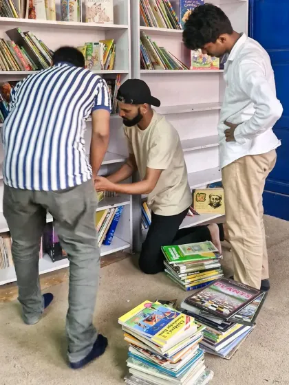 Every book placed on a shelf is a new world waiting to be discovered. Here, volunteers from Firstsource carefully arrange stories at our Kings of Castle Library, making it ready for our children to explore.