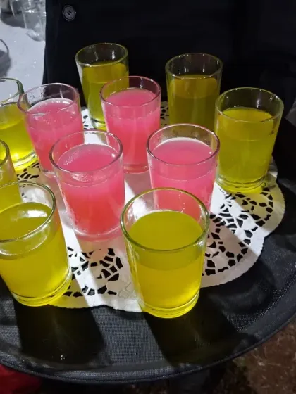 Welcome drinks served on a tray at a 58th birthday event in Vashi. Simple, refreshing, and a great way to start the party.