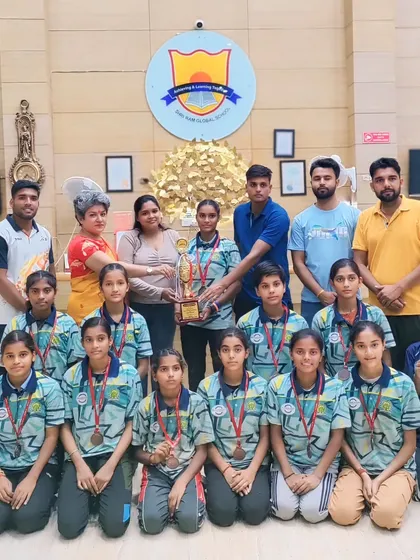 Our girls' Kho-Kho team with their trophy after becoming the 2nd runner-up at the CBSE National Championship. We provide equal opportunities and dedicated coaching for both our male and female athletes.