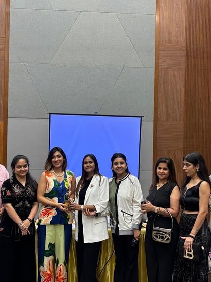 Posing with a group of participants after a successful session. Seeing these women leave with renewed confidence is the best part of my job.
